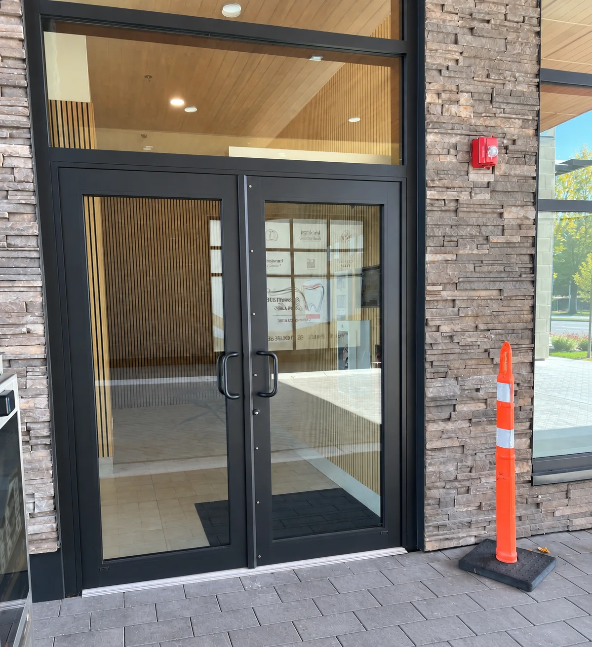 Newly installed 400T Series thermal commercial entrance door